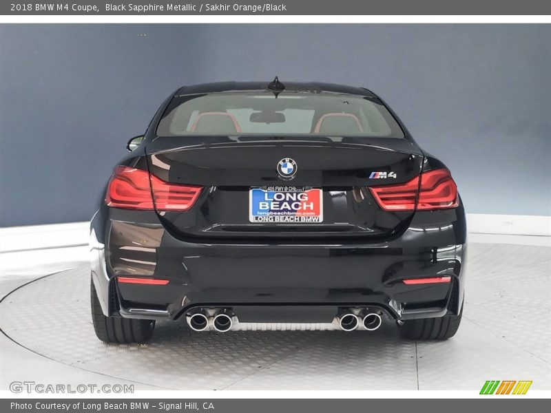 Black Sapphire Metallic / Sakhir Orange/Black 2018 BMW M4 Coupe
