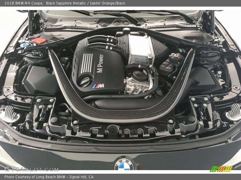 Black Sapphire Metallic / Sakhir Orange/Black 2018 BMW M4 Coupe