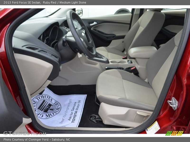 Ruby Red / Medium Light Stone 2013 Ford Focus SE Sedan