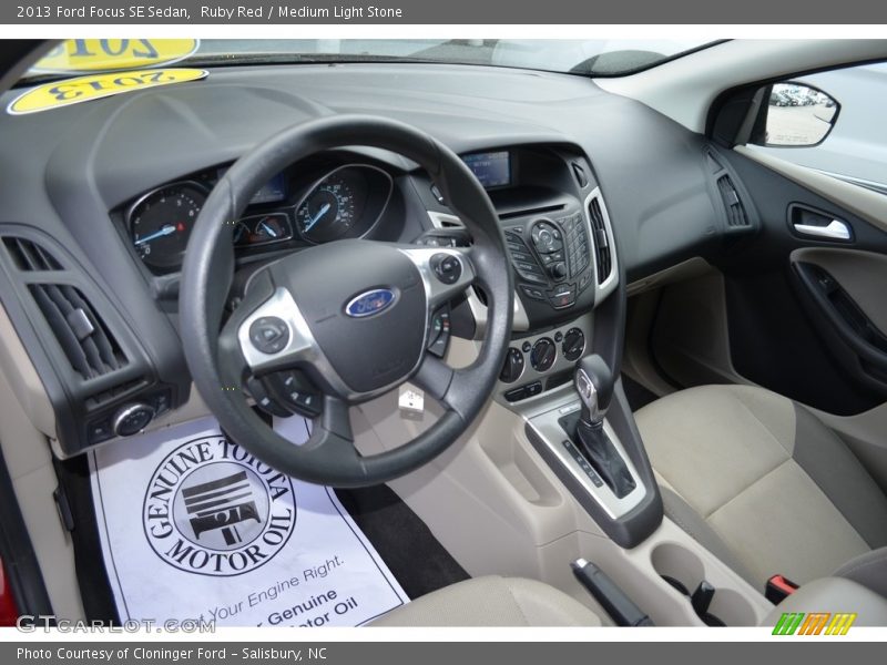 Ruby Red / Medium Light Stone 2013 Ford Focus SE Sedan