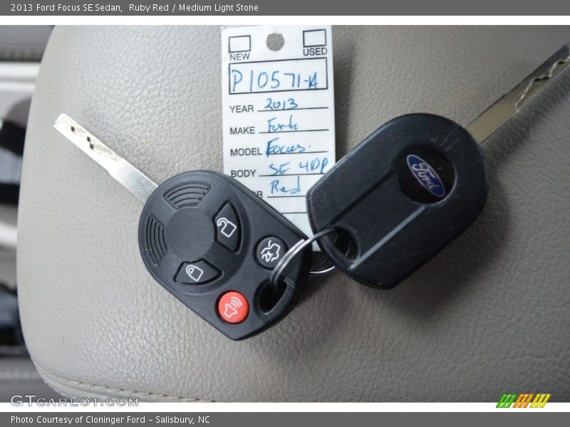 Ruby Red / Medium Light Stone 2013 Ford Focus SE Sedan