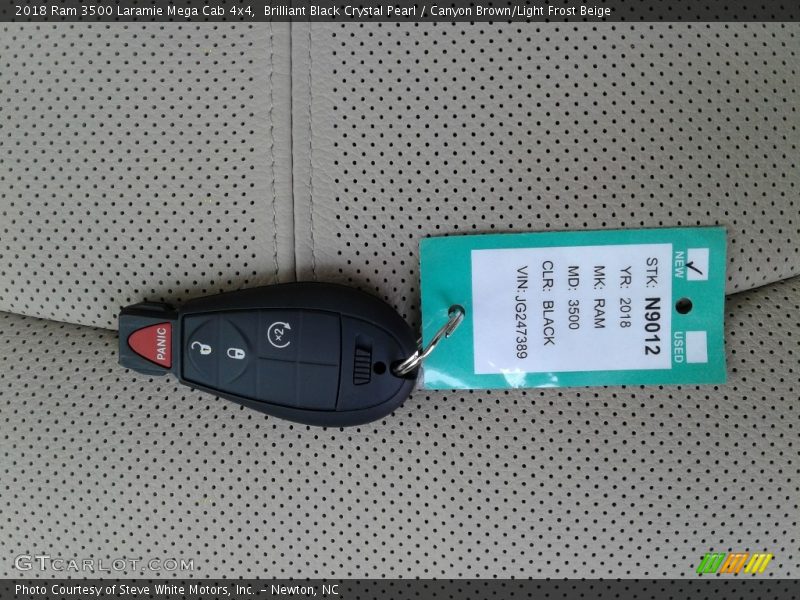 Brilliant Black Crystal Pearl / Canyon Brown/Light Frost Beige 2018 Ram 3500 Laramie Mega Cab 4x4