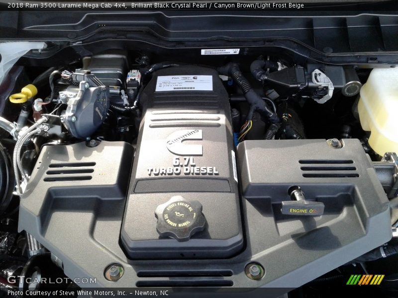 Brilliant Black Crystal Pearl / Canyon Brown/Light Frost Beige 2018 Ram 3500 Laramie Mega Cab 4x4