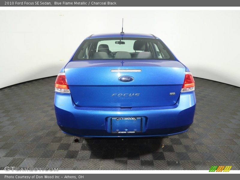 Blue Flame Metallic / Charcoal Black 2010 Ford Focus SE Sedan