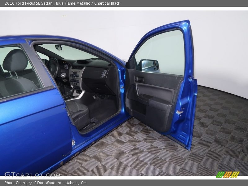 Blue Flame Metallic / Charcoal Black 2010 Ford Focus SE Sedan