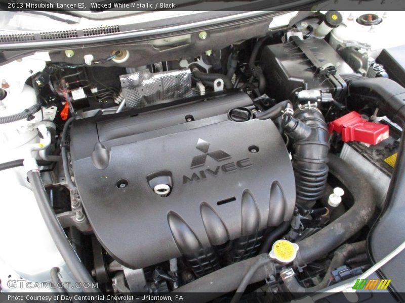 Wicked White Metallic / Black 2013 Mitsubishi Lancer ES