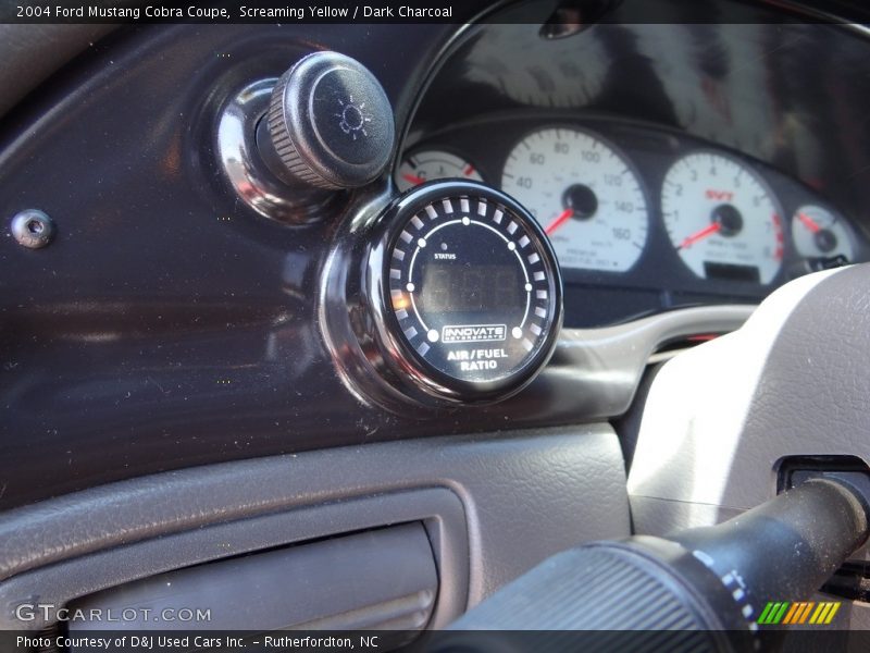 Screaming Yellow / Dark Charcoal 2004 Ford Mustang Cobra Coupe