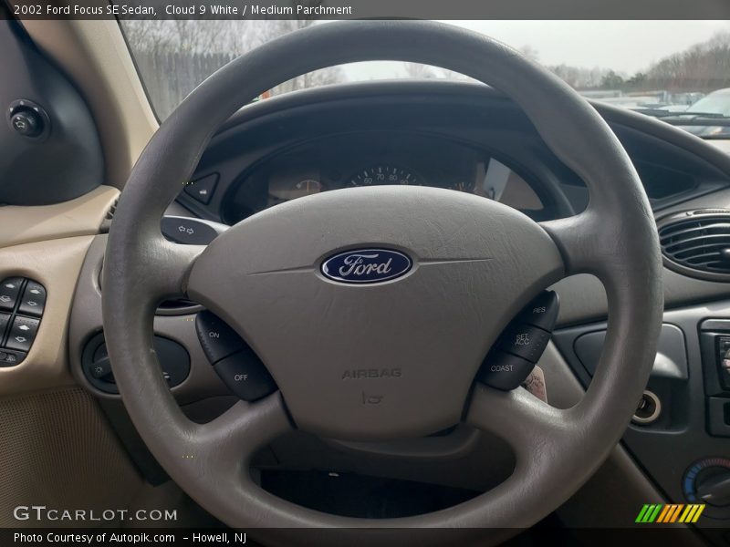 Cloud 9 White / Medium Parchment 2002 Ford Focus SE Sedan