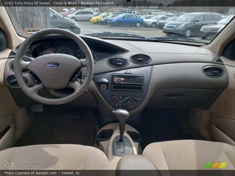 Cloud 9 White / Medium Parchment 2002 Ford Focus SE Sedan