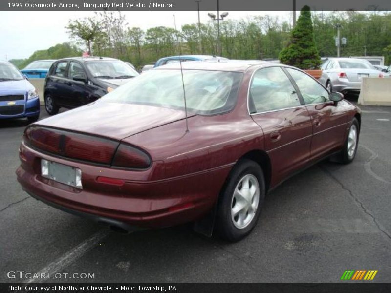Burgundy Red Metallic / Neutral 1999 Oldsmobile Aurora