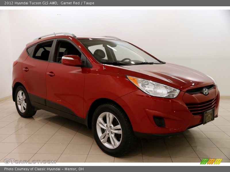 Garnet Red / Taupe 2012 Hyundai Tucson GLS AWD