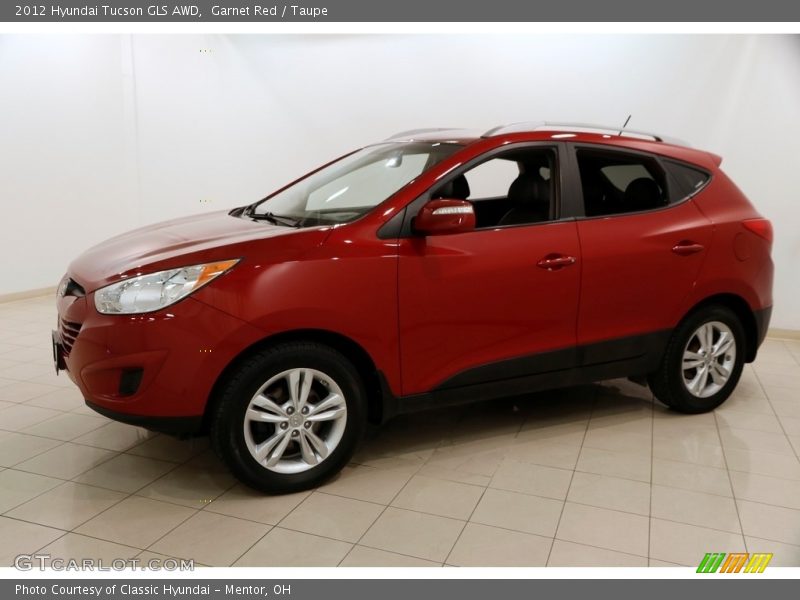Garnet Red / Taupe 2012 Hyundai Tucson GLS AWD