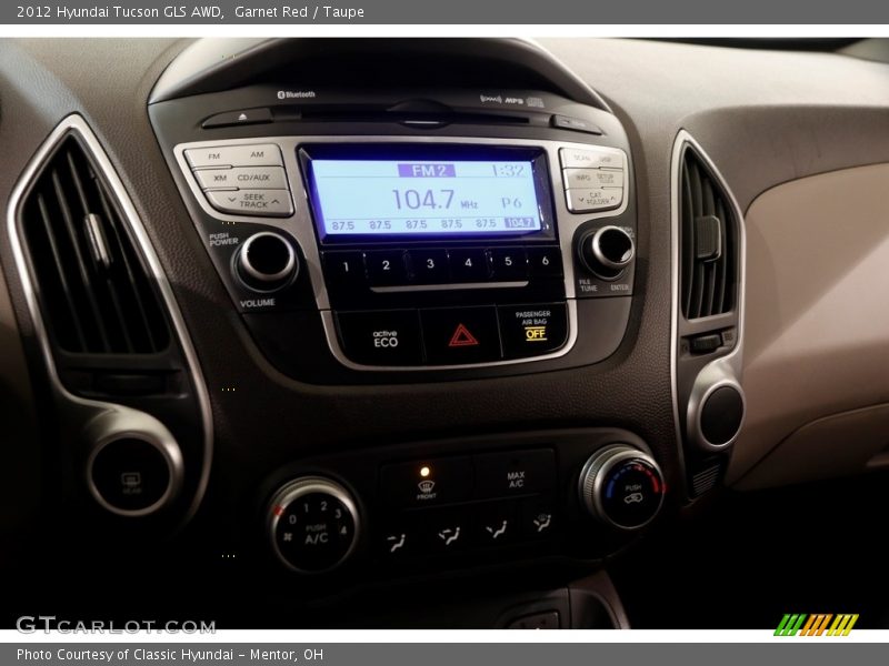 Garnet Red / Taupe 2012 Hyundai Tucson GLS AWD