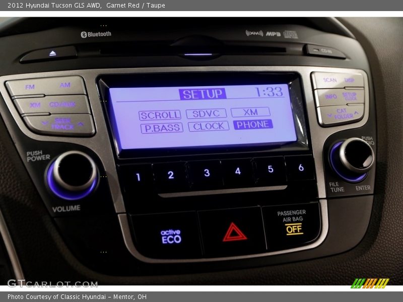 Garnet Red / Taupe 2012 Hyundai Tucson GLS AWD