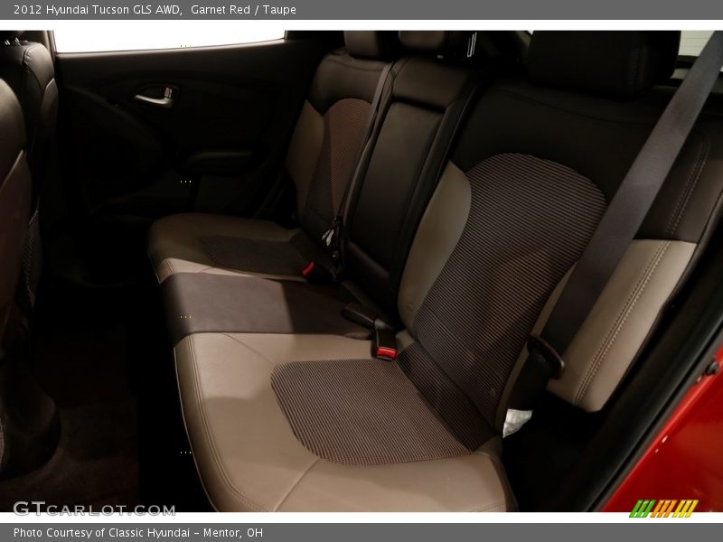 Garnet Red / Taupe 2012 Hyundai Tucson GLS AWD