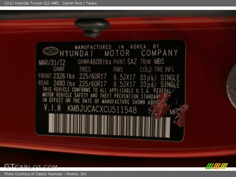 Garnet Red / Taupe 2012 Hyundai Tucson GLS AWD