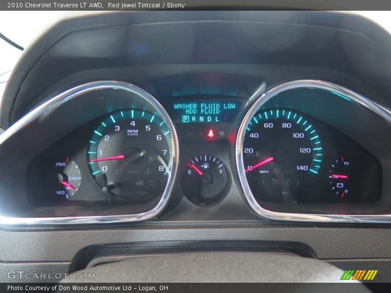Red Jewel Tintcoat / Ebony 2010 Chevrolet Traverse LT AWD