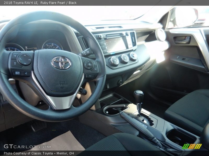 Ruby Flare Pearl / Black 2018 Toyota RAV4 LE