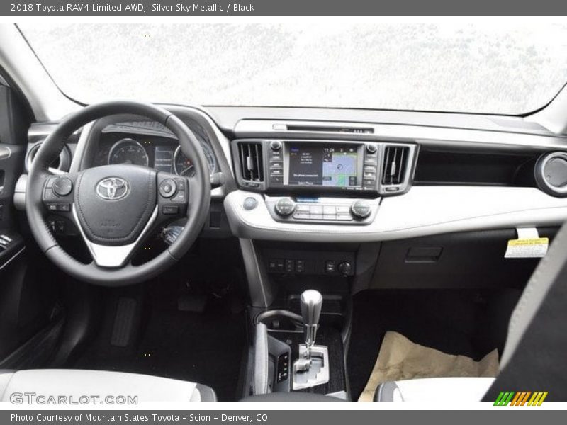 Silver Sky Metallic / Black 2018 Toyota RAV4 Limited AWD