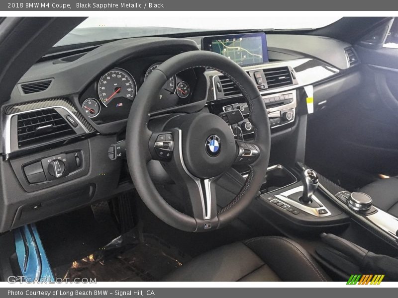 Black Sapphire Metallic / Black 2018 BMW M4 Coupe