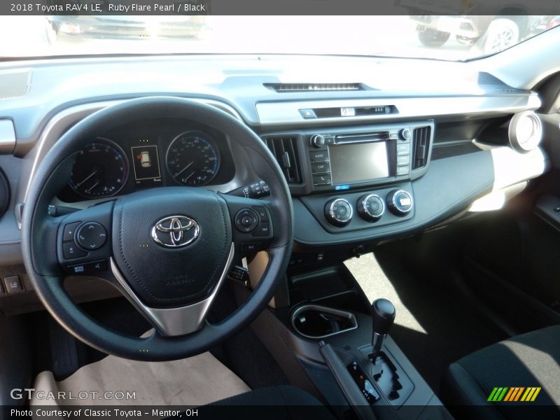 Ruby Flare Pearl / Black 2018 Toyota RAV4 LE