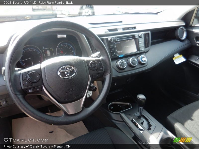 Ruby Flare Pearl / Black 2018 Toyota RAV4 LE