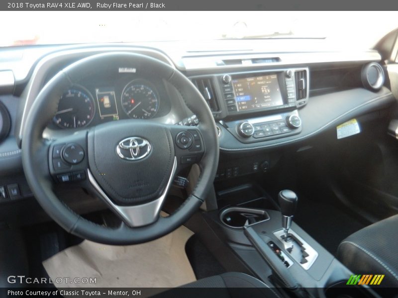 Ruby Flare Pearl / Black 2018 Toyota RAV4 XLE AWD