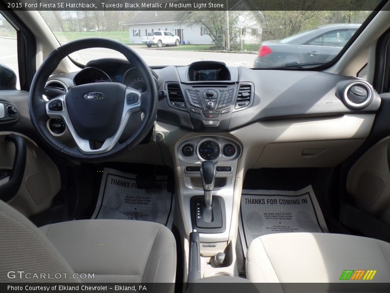 Tuxedo Black Metallic / Medium Light Stone 2015 Ford Fiesta SE Hatchback