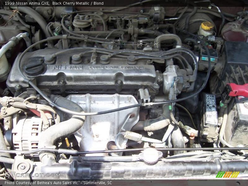 Black Cherry Metallic / Blond 1999 Nissan Altima GXE
