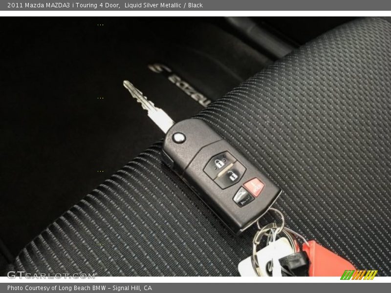 Liquid Silver Metallic / Black 2011 Mazda MAZDA3 i Touring 4 Door