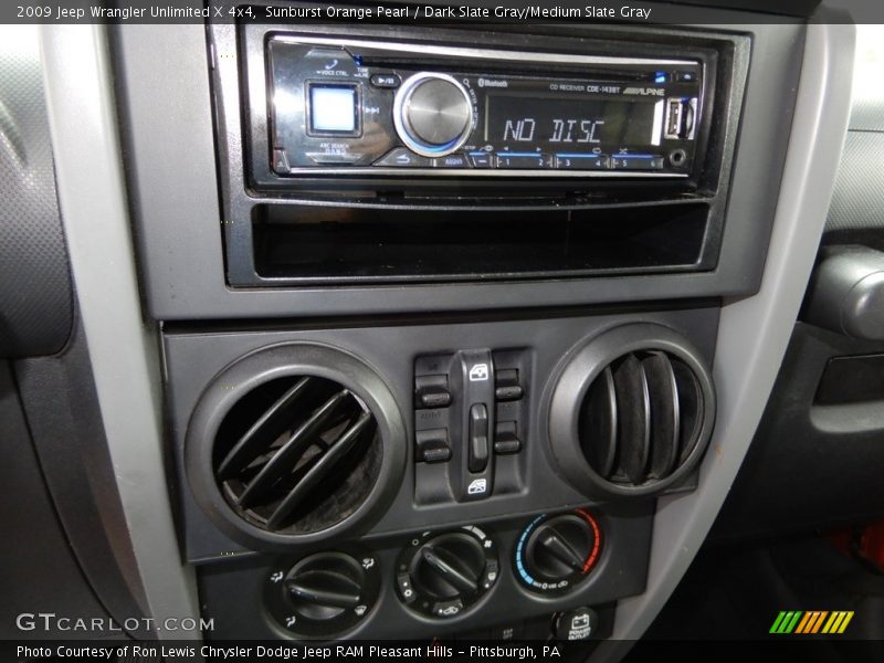 Sunburst Orange Pearl / Dark Slate Gray/Medium Slate Gray 2009 Jeep Wrangler Unlimited X 4x4