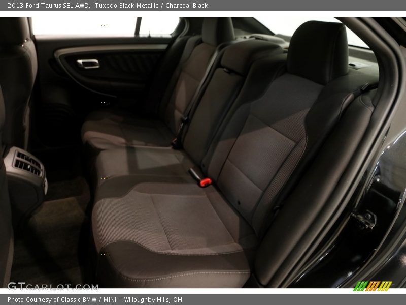 Tuxedo Black Metallic / Charcoal Black 2013 Ford Taurus SEL AWD