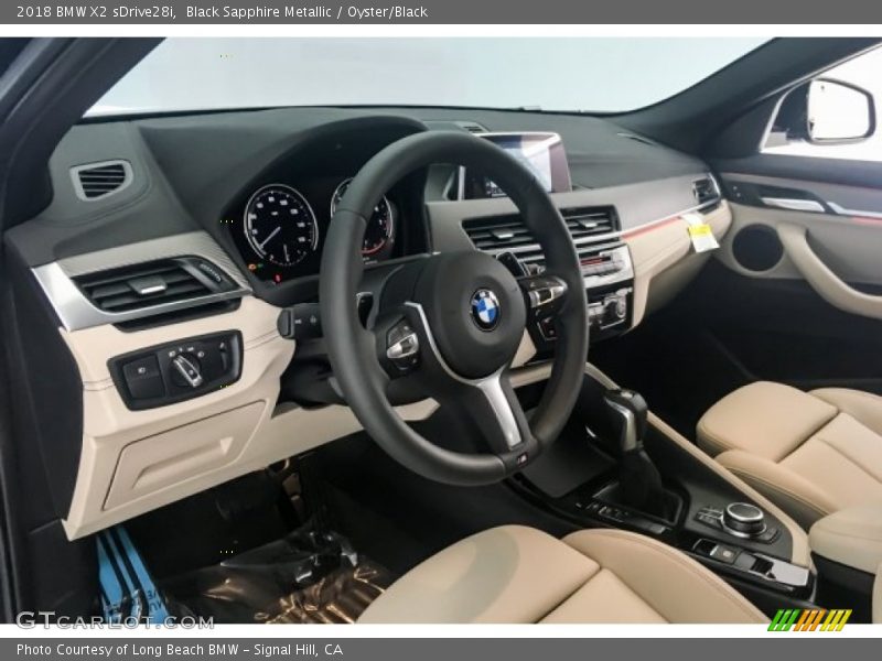 Black Sapphire Metallic / Oyster/Black 2018 BMW X2 sDrive28i