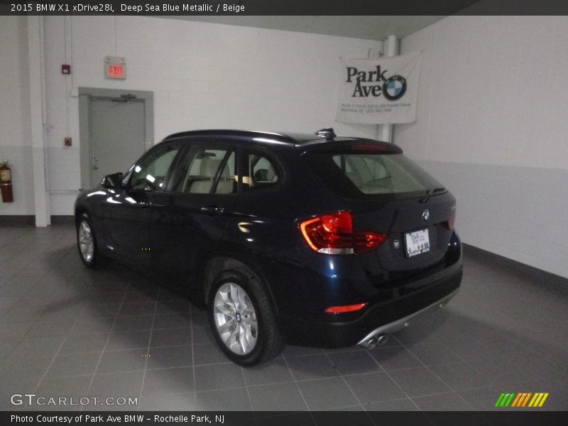 Deep Sea Blue Metallic / Beige 2015 BMW X1 xDrive28i