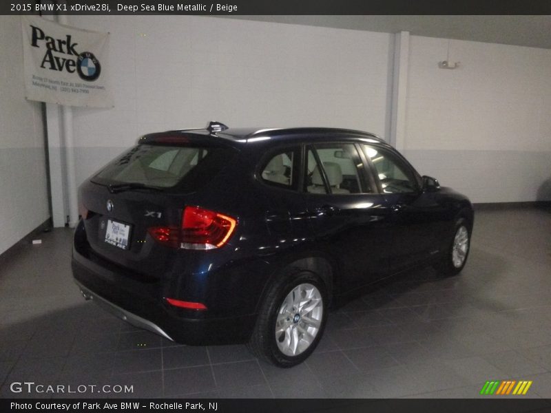 Deep Sea Blue Metallic / Beige 2015 BMW X1 xDrive28i