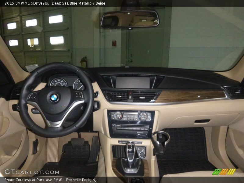 Deep Sea Blue Metallic / Beige 2015 BMW X1 xDrive28i