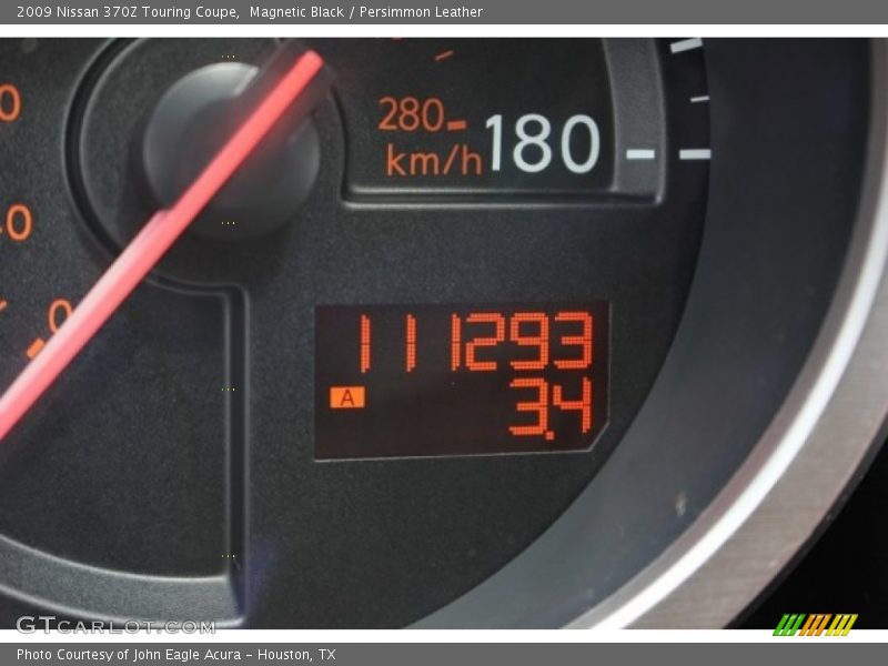 Magnetic Black / Persimmon Leather 2009 Nissan 370Z Touring Coupe