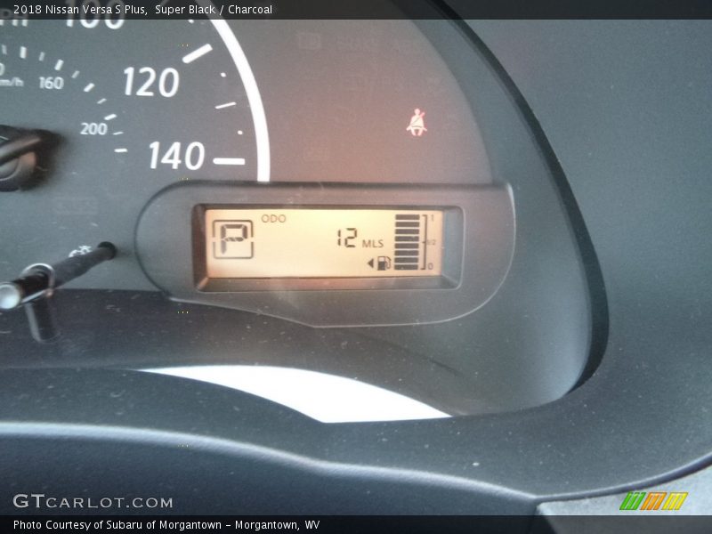 Super Black / Charcoal 2018 Nissan Versa S Plus