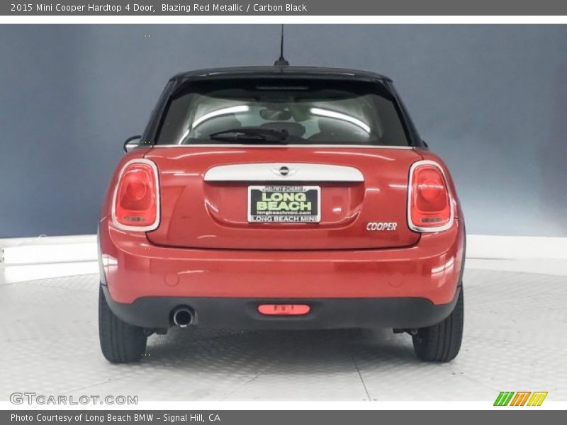 Blazing Red Metallic / Carbon Black 2015 Mini Cooper Hardtop 4 Door