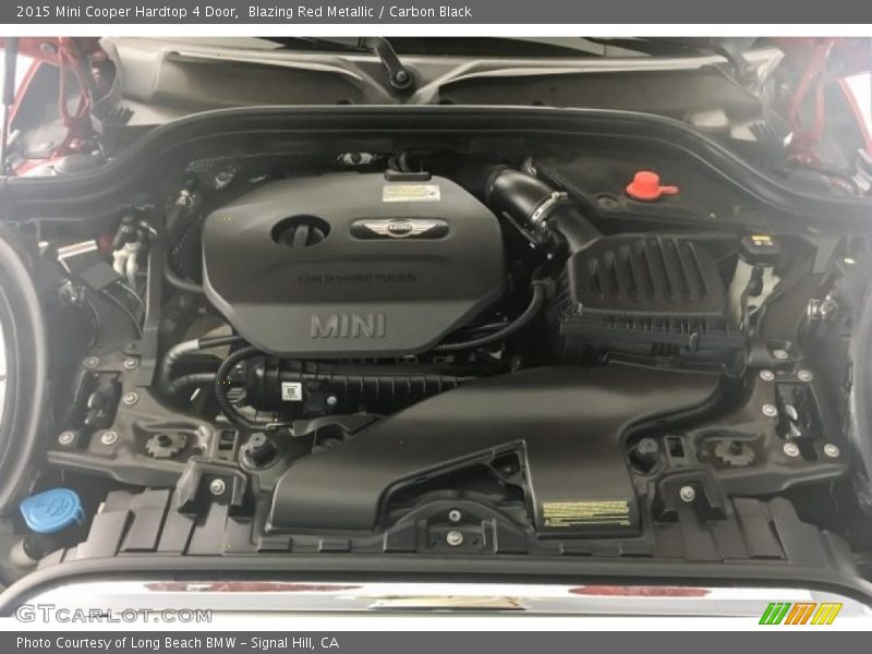 Blazing Red Metallic / Carbon Black 2015 Mini Cooper Hardtop 4 Door