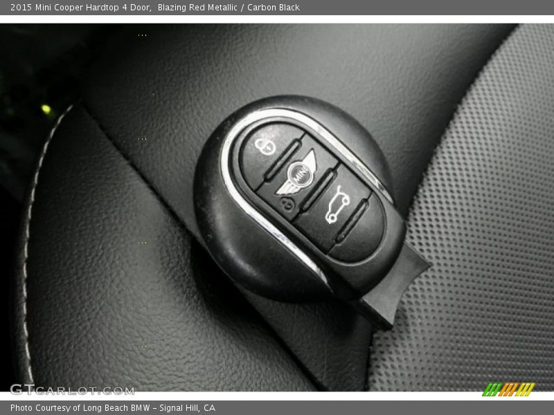 Blazing Red Metallic / Carbon Black 2015 Mini Cooper Hardtop 4 Door