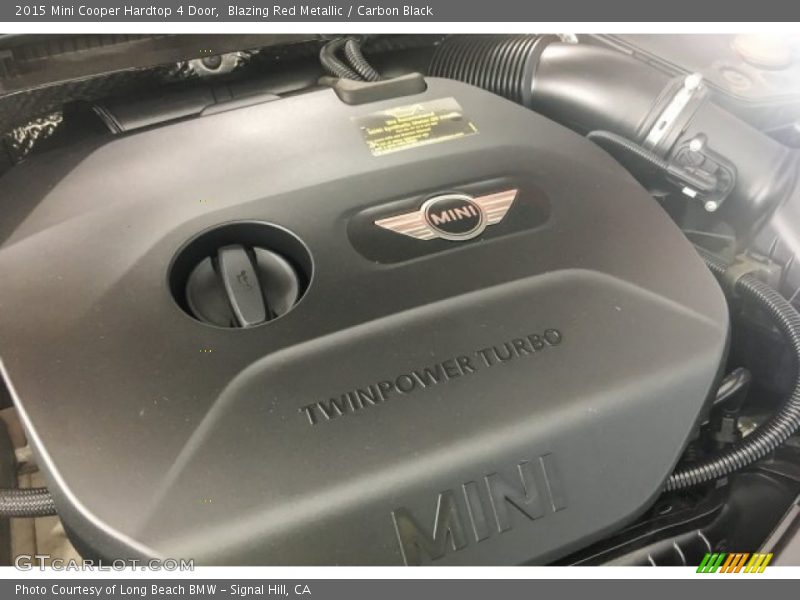 Blazing Red Metallic / Carbon Black 2015 Mini Cooper Hardtop 4 Door