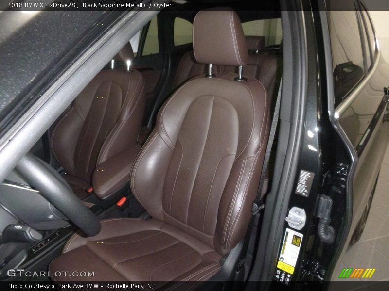 Black Sapphire Metallic / Oyster 2018 BMW X1 xDrive28i
