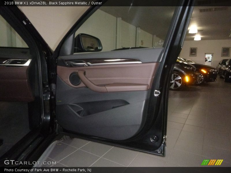 Black Sapphire Metallic / Oyster 2018 BMW X1 xDrive28i