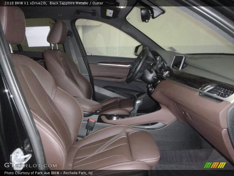 Black Sapphire Metallic / Oyster 2018 BMW X1 xDrive28i