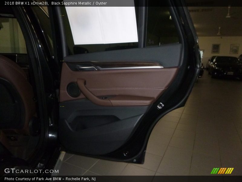 Black Sapphire Metallic / Oyster 2018 BMW X1 xDrive28i
