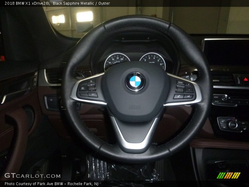 Black Sapphire Metallic / Oyster 2018 BMW X1 xDrive28i