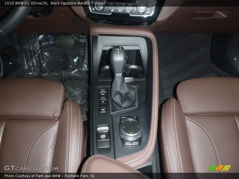 Black Sapphire Metallic / Oyster 2018 BMW X1 xDrive28i