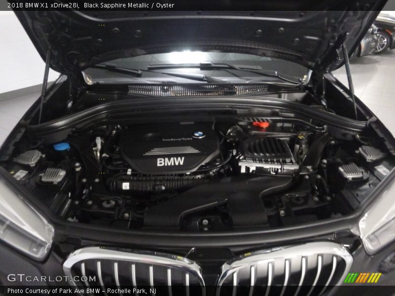 Black Sapphire Metallic / Oyster 2018 BMW X1 xDrive28i