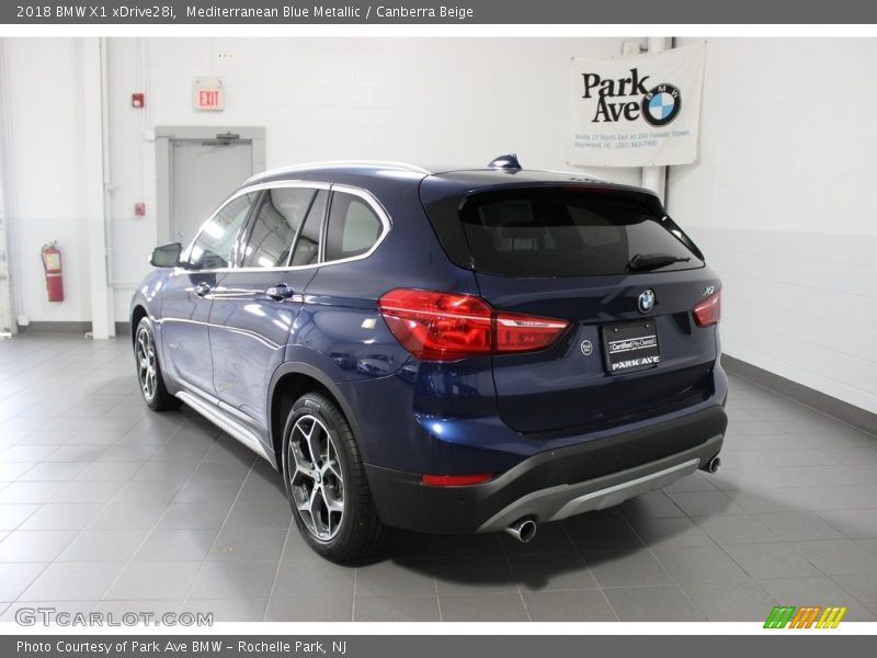Mediterranean Blue Metallic / Canberra Beige 2018 BMW X1 xDrive28i